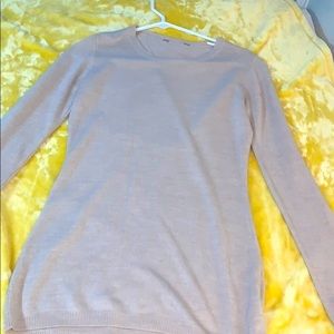 Long sweater. Cute with jeans, leggings and boots